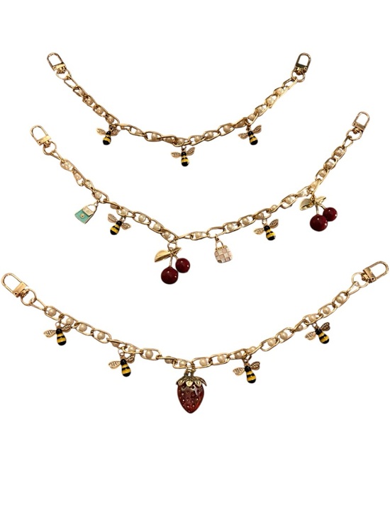 Handbags - Made by YOLO Gold-Tone Handbag Charm Set of 3 w/ Cherry, Purses & Bee Charms